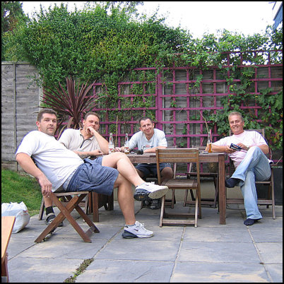 Gavin Giddings (right) with his long-standing team during his years as a contractor